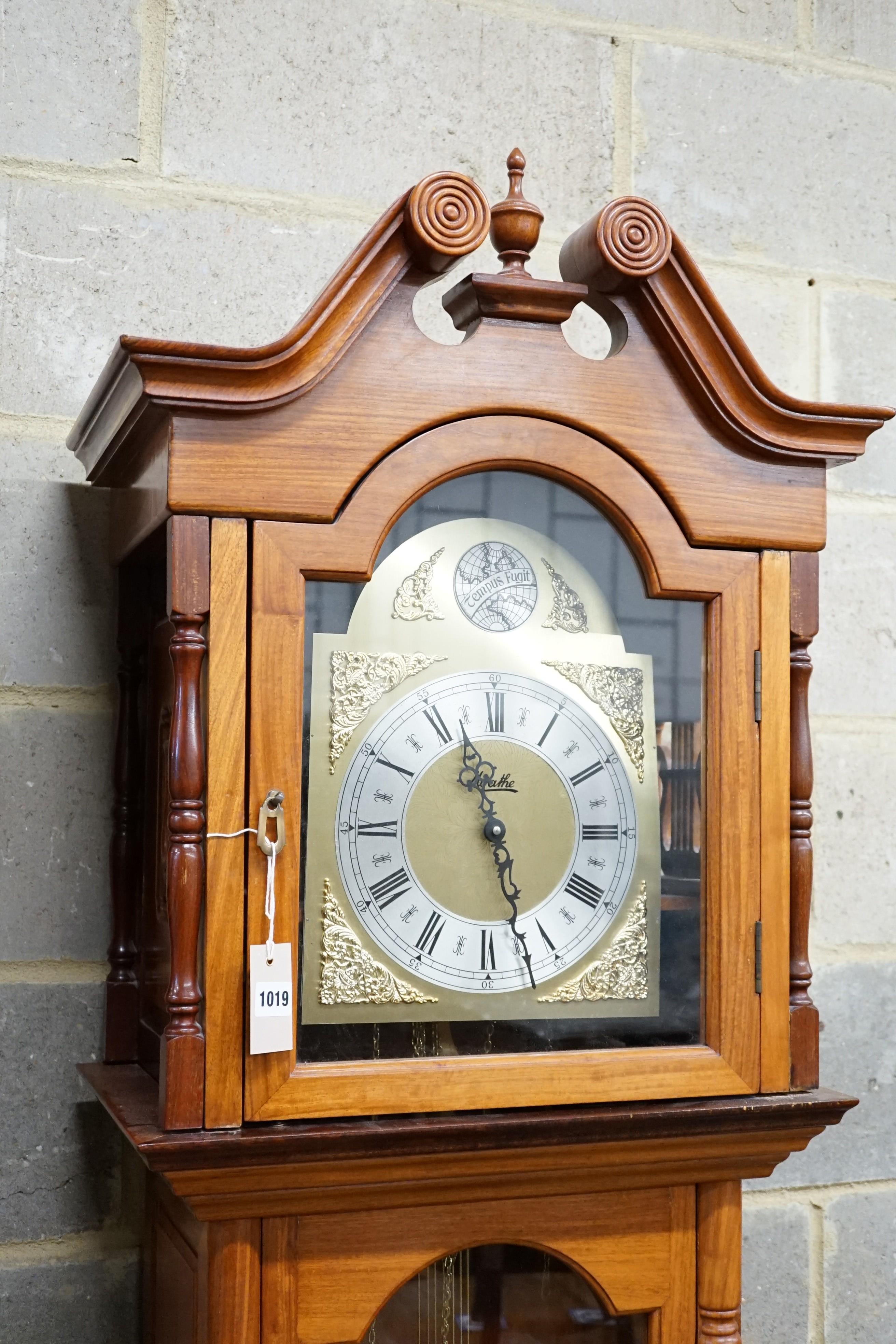 A Moathe padouk cased eight day longcase clock, height 220cm